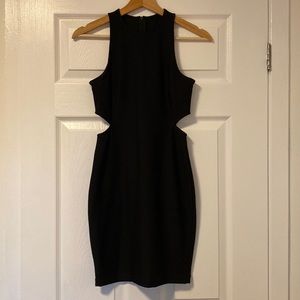 Black bodycon mini dress with side cutouts